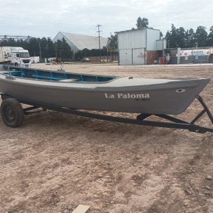 1 CANOA CON TRAILER DE 1 EJE. 